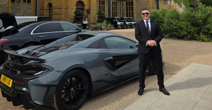 Luxury chauffeur service in England city centre — professional executive vehicle