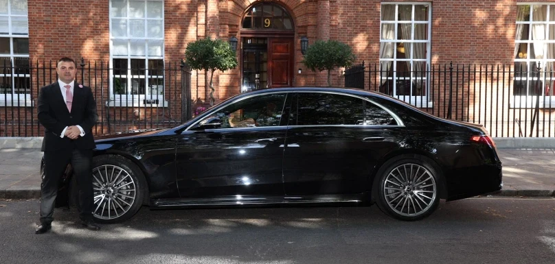 Luxury chauffeur service in England city centre — professional executive vehicle