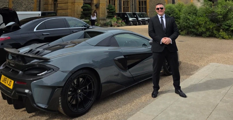 Luxury chauffeur service in England city centre — professional executive vehicle