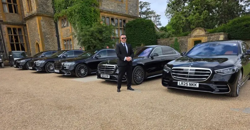 Luxury chauffeur service in England city centre — professional executive vehicle